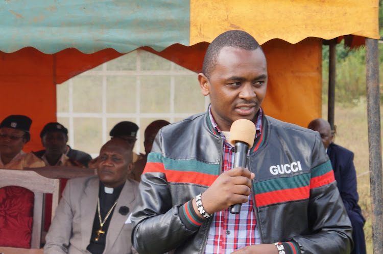 Lari Kirenga MCA Joseph Karichu during an event in his ward.