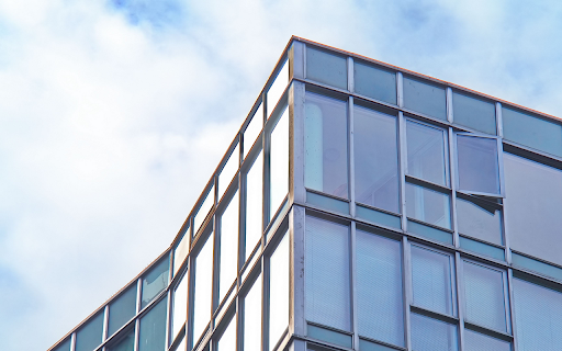 Contemporary Building Reflects Clouds in screenshot 2