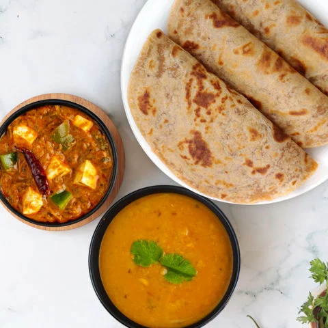 Kadhai Paneer, Yellow Dal Tadka, Paratha Thali