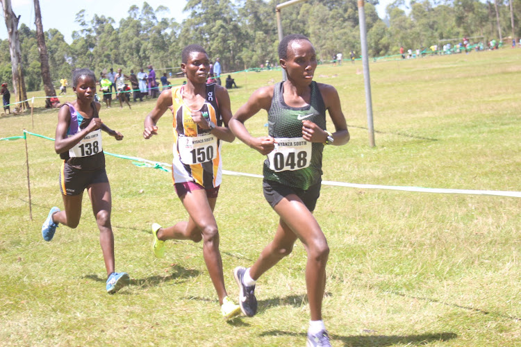 Christine Oigo leads Teresa Omosa and Nancy Kerage in the senior women's 10km action