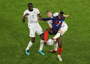 France's Paul Pogba in action with Germany's Antonio Rudiger on June 15 2021.