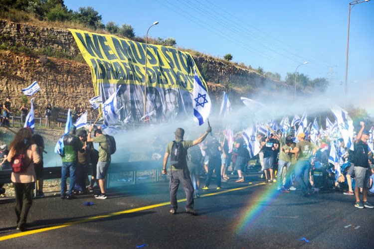 People block a highway to Jerusalem on ‘Day of Paralysis’ in protest against Israeli Prime Minister Benjamin Netanyahu and his nationalist coalition government’s judicial overhaul, on July 11 2023. Picture: REUTERS/RONEN ZVULUN