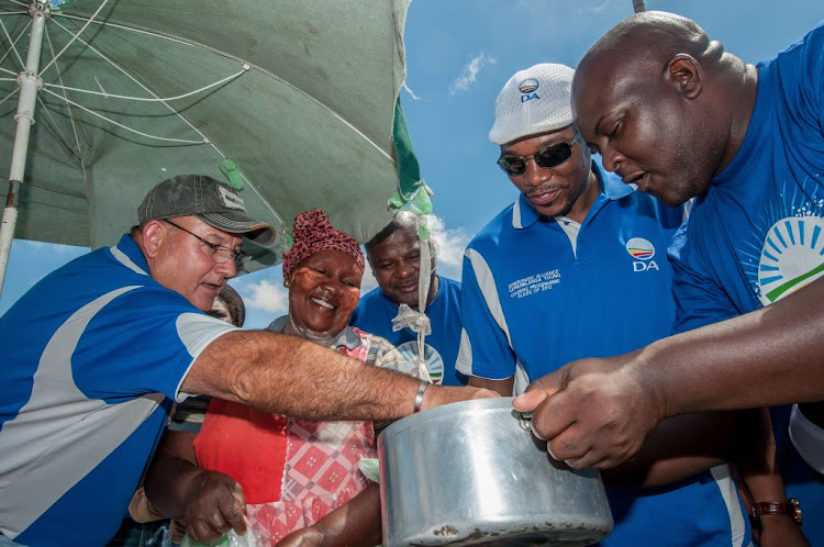 Eastern Cape premier candidate Nqaba Bhanga, right, DA leader Mmusi Maimane, second from right, and axed Nelson Mandela Bay mayor, Athol Trollip, left, on January 9 2016