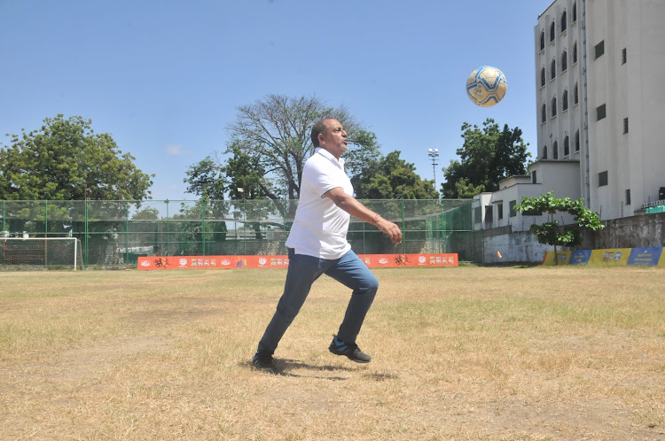 Suleiman Shahbal shows his football prowess at Serani grounds Mombasa during the launch of the Shahbal Super Cup