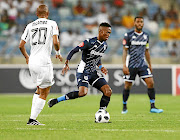 Thabang Monare of Bidvest Wits and Xola Mlambo of Orlando Pirates  at Moses Mabhida Stadium at the weekend.  