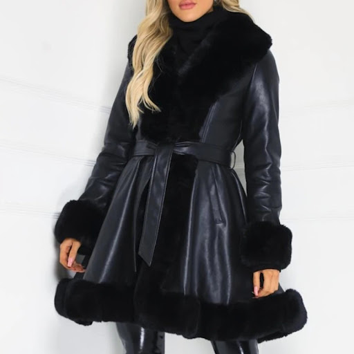 Title 3, Fur coat featuring a lotus leaf hem and faux le...