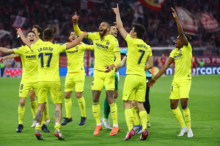 Villarreal players celebrate their 1-1 draw against Bayern Munich.