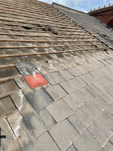 This roof had the slates on backwards because they was painted orange on the front
