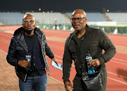 Amazulu FC owner Sandile Zungu, right,and brother Manzini Zungu during a DStv Premiership match between their team and Swallows FC at Dobsonville Stadium.