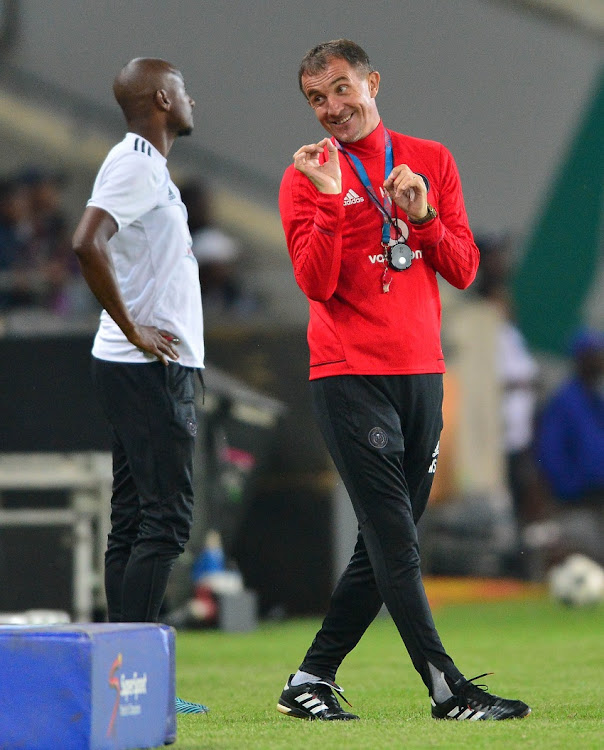 Milutin Sredojevic, coach of Orlando Pirates and Rhulani Mokwena assistant coach of Orlando Pirates during the Absa Premiership 2017/18 football match between Orlando Pirates and AmaZulu at Orlando Stadium, Johannesburg on 09 December 2017.