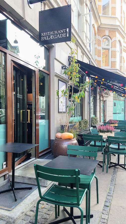 Restaurant Palaegade in Copenhagen offering traditional Danish smørrebrød. These are open-faced sandwiches built on buttered dense sourdough rye bread