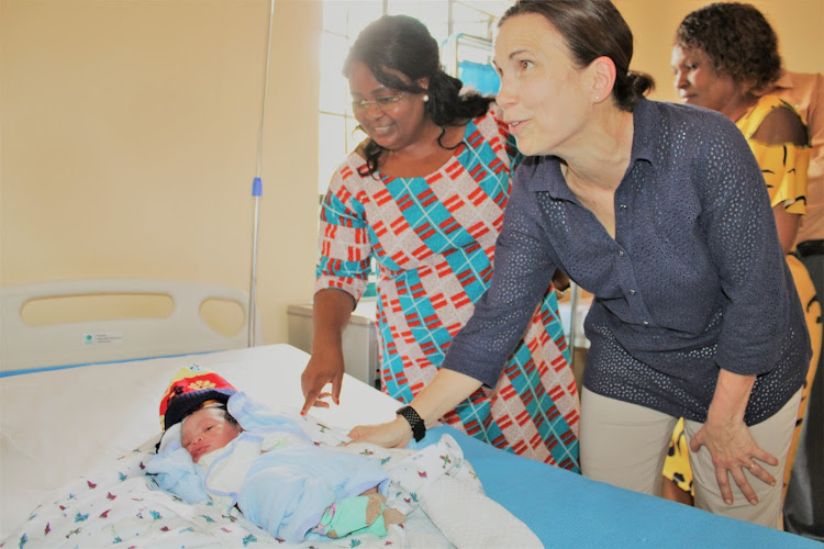 Winnie Kitetu and the CMMB president Mary Powers at the maternity wing.