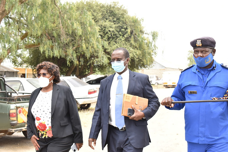 Naivasha MP Jayne Kihara, DCIO Aden Mohammed and OCPD Samuel Waweru at Naivasha police station