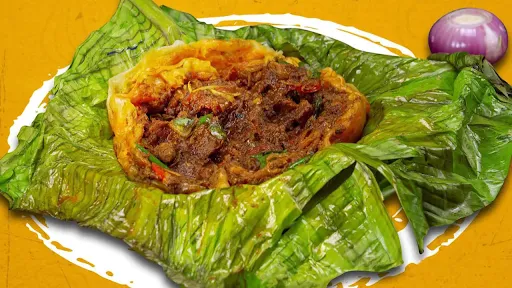 Kizhi Chicken Parotta ( Chicken Parotta In Banana Leaf)