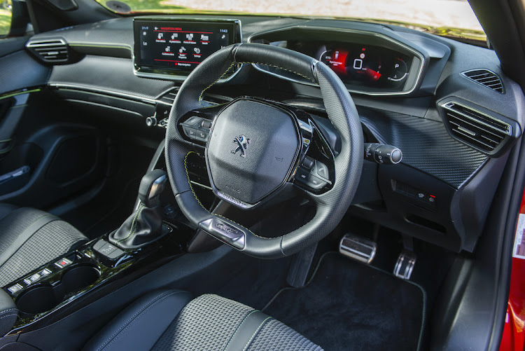 The Peugeot's quirky interior is well built and full of features.