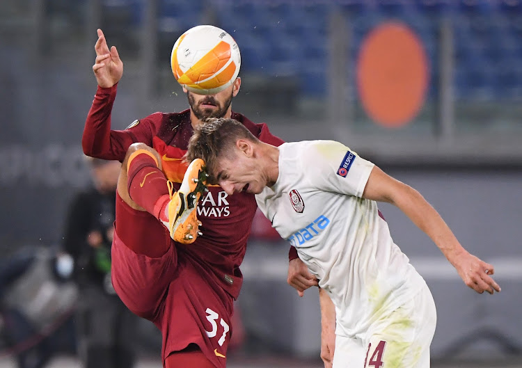 AS Roma's Leonardo Spinazzola in action with CFR Cluj's Catalin Itu