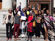 Transgender sex workers and activists rejoice outside the Cape Town high court after a judgment that will see widespread changes for transgender women prisoners in male prisons. 