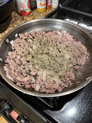 Cook hamburger with onion