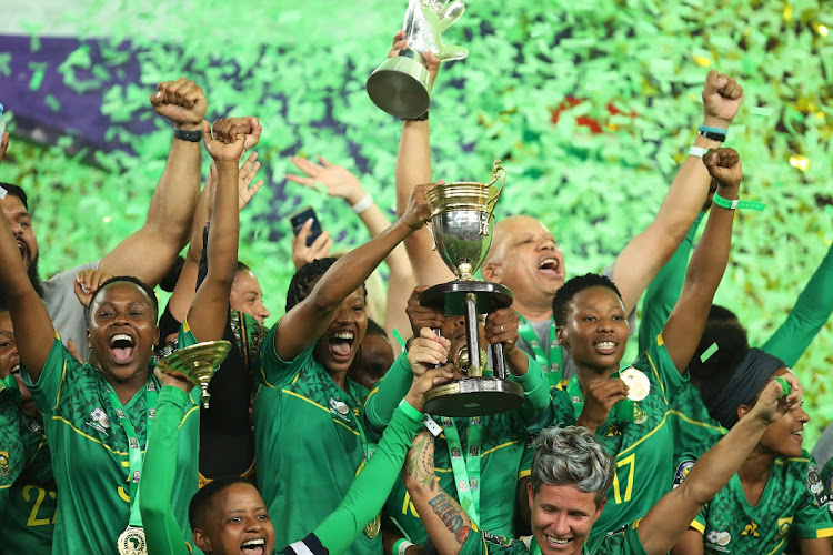 SA lift the winner's trophy.