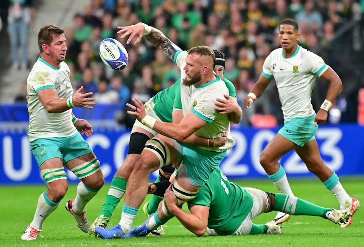 The Springboks' RG Snyman offloads in their Rugby World Cup pool B match against Ireland at Stade de France in Paris on Saturday night.