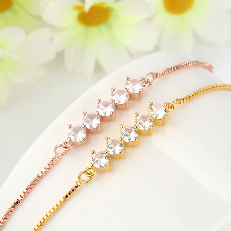 Title 1, Rosegoud vergulde armband met 10 zirkonia diama...