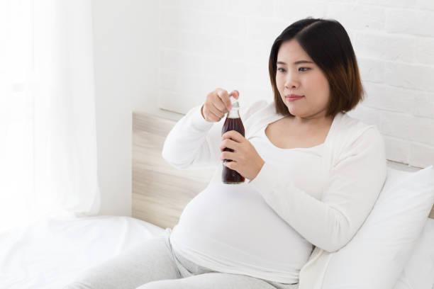 Drink Cola During Pregnancy Pregnant Women Should Not Drink Caffeine  Beverage Stock Photo - Download Image Now - iStock