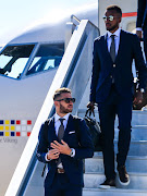 Marcus Rohden (left) and Issac Kiese Thelin of the Swedish national soccer team are welcomed at Russia's Gelendzhik Airport ahead of the 2018 FIFA World Cup. 