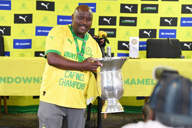 Mamelodi Sundowns Ladies coach Jerry Tshabalala with the Caf Women's Champions League trophy.