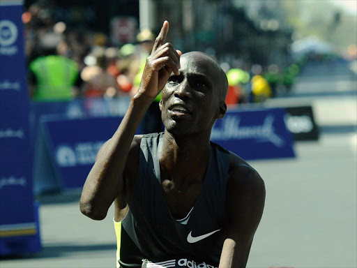 Wesley Korir of Kenya gestures after crossing the finish line as the winner in the men’s division of the 116th Boston Marathon in Boston, Massachusetts, USA, 16 April 2012. /EPA