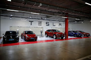 Investors believe Tesla can make the shift from a niche carmaker into a global leader in cleaner cars.