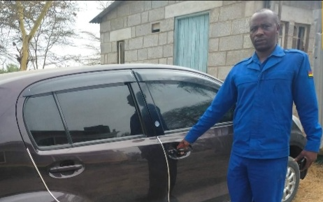 A police officer opens the door of a motor vehicle impounded at Athi River police station after a child was found driving it along Mombasa road in Athi River, Machakos County on Wednesday, August 24, 2022.