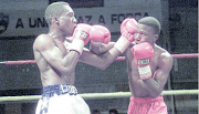 Trainer Abram Lubisi, left, and his wife Jane are unhappy with Boxing SA acting CEO's conduct.