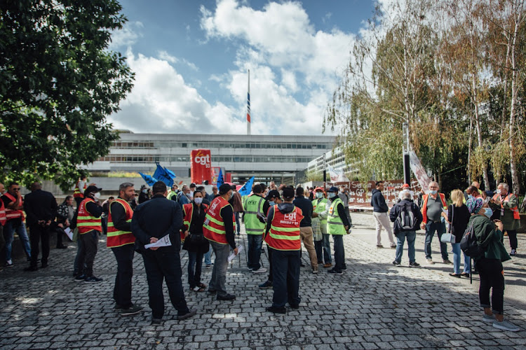 Workers and General Confederation of Labour (CGT) union members gather during a protest outside the Air France-KLM headquarters in Roissy, France, on Friday, July 3, 2020. Picture: CYRIL MARCHILHACY/BLOOMBERG