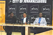 Johannesburg MMC for human settlements Mlungisi Mabaso, left, mayor Mpho Phalatse and GFIS acting head Lizzie Ramogale at a media briefing on housing scams on Thursday.