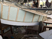 The collapsed NewsCafe roof Picture Credit: EMER-G-MED ‏@EMER_G_MED