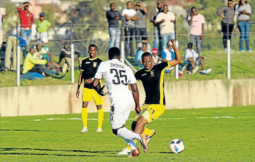 ONE GOOD TURN: Mthatha Bucks’ Mazwi Mncube, right, dribbling past Siyabonga Shoyisa of Stellebosch FC, is hoping to see Amathol’amnyama getting back to winning ways when they lock horns with Jomo Cosmos Picture: ZINGISA MVUMVU