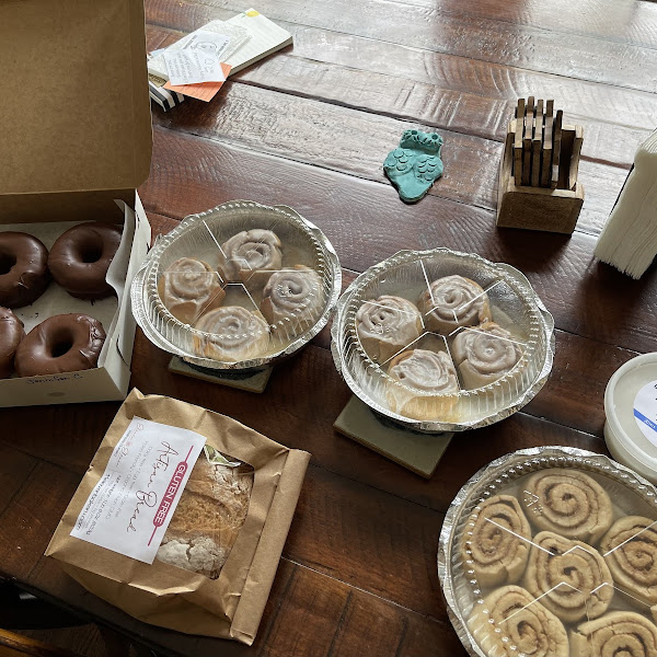 Double chocolate donuts, baked in store cinnamon rolls, take n bake cinnamon rolls with icing and a loaf of Artisan Bread