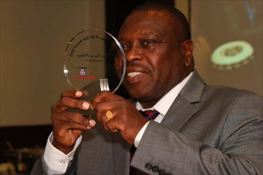 Captain James Karanja receives the African Agribusiness Entrepreneur award.