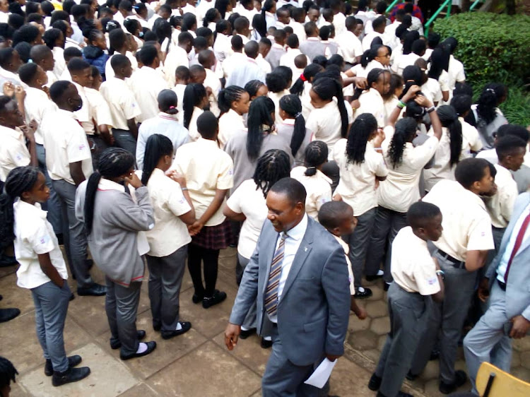 Students attending assembly as the await the announcement of the Cambridge Exam results