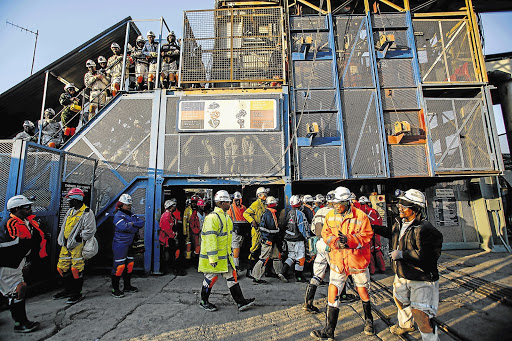 BACK TO WORK: On July 4, Thembelani 1 shaft in Rustenburg was a hive of activity as miners packed the area to go underground