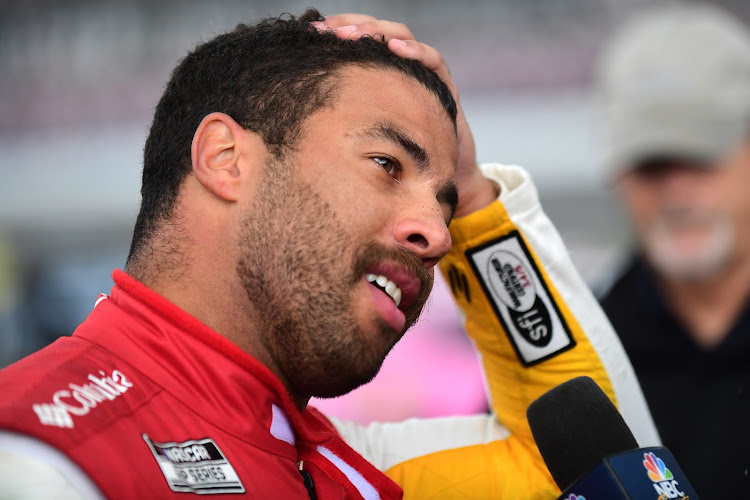 Wallace became the first African American to win a race in NASCAR's premier series since Wendell Scott in 1963.