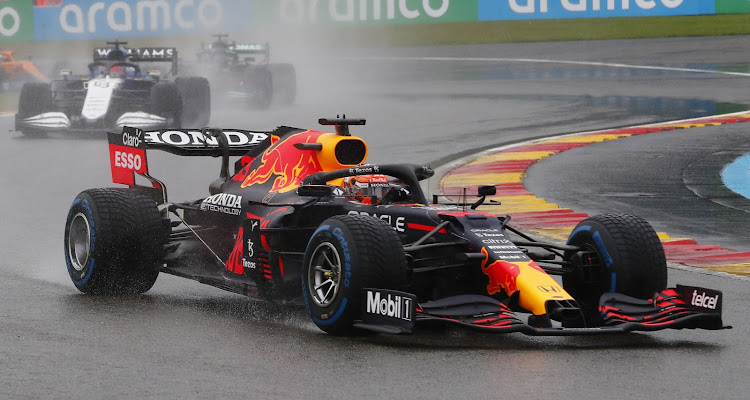 Max Verstappen leads the field behind the safety car. Picture: REUTERS
