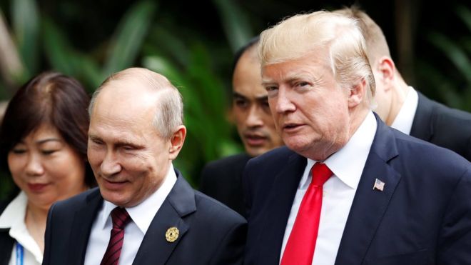 REUTERS Image caption Presidents Vladimir Putin and Donald Trump, pictured in 2017, have pulled out of the INF treaty