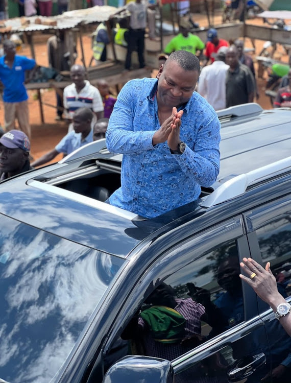 Former Sports Cabinet Secretary Rashid Echesa interacting with Mumias residents on April 12, 2024.