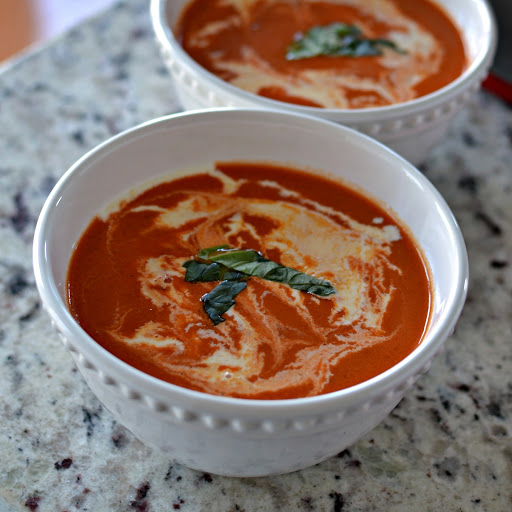 Tomato Bisque is a one pot delicious creamy tomato soup made in less than one hour. It is perfect served with Caprese Grilled Cheese or Italian Chopped Salad with Fresh Italian Dressing.  It is kid friendly and leftover soup heats up well in the microwave