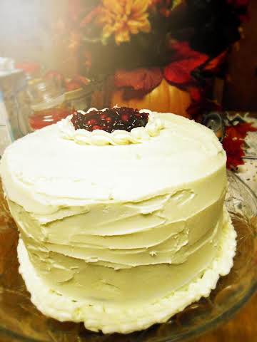 Cranberry Eggnog  Cake with Orange Buttercream