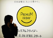 A woman in Tokyo, Japan, walks past the logo of the Premium Friday campaign, which encourages companies to let workers out a few hours early on the last Friday of every month.