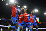 Crystal Palace's Michael Olise celebrates scoring their second goal with Jean-Philippe Mateta and Naouirou Ahamada.