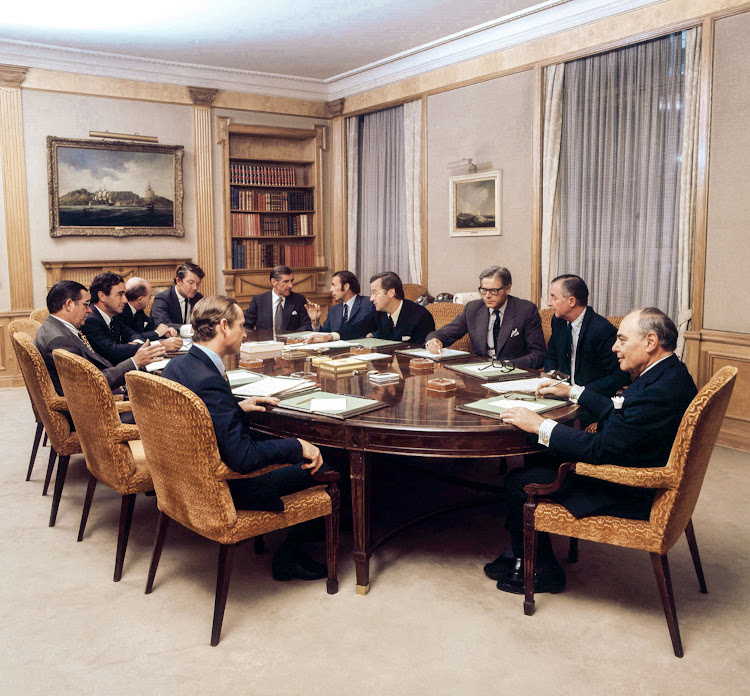 A meeting of the Anglo American executive committee in 1977. Anti- clockwise far right: Gavin Relly, Julian Ogilvie Thompson and others. Picture: ANGLO AMERICAN
