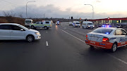 A crime scene at Zephania Mothopeng Street has shut a busy motorway in Orlando, Soweto, on Tuesday. 